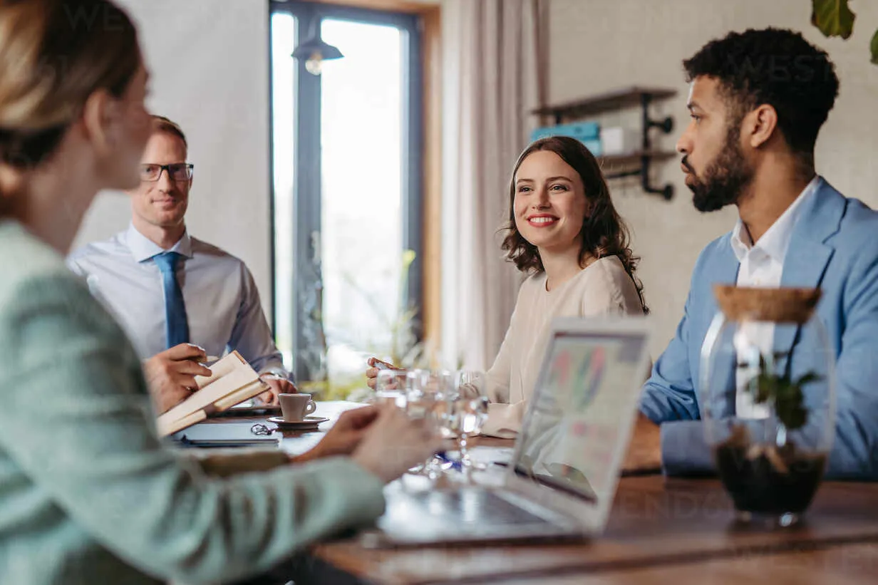 A team of professionals collaborating around a conference table